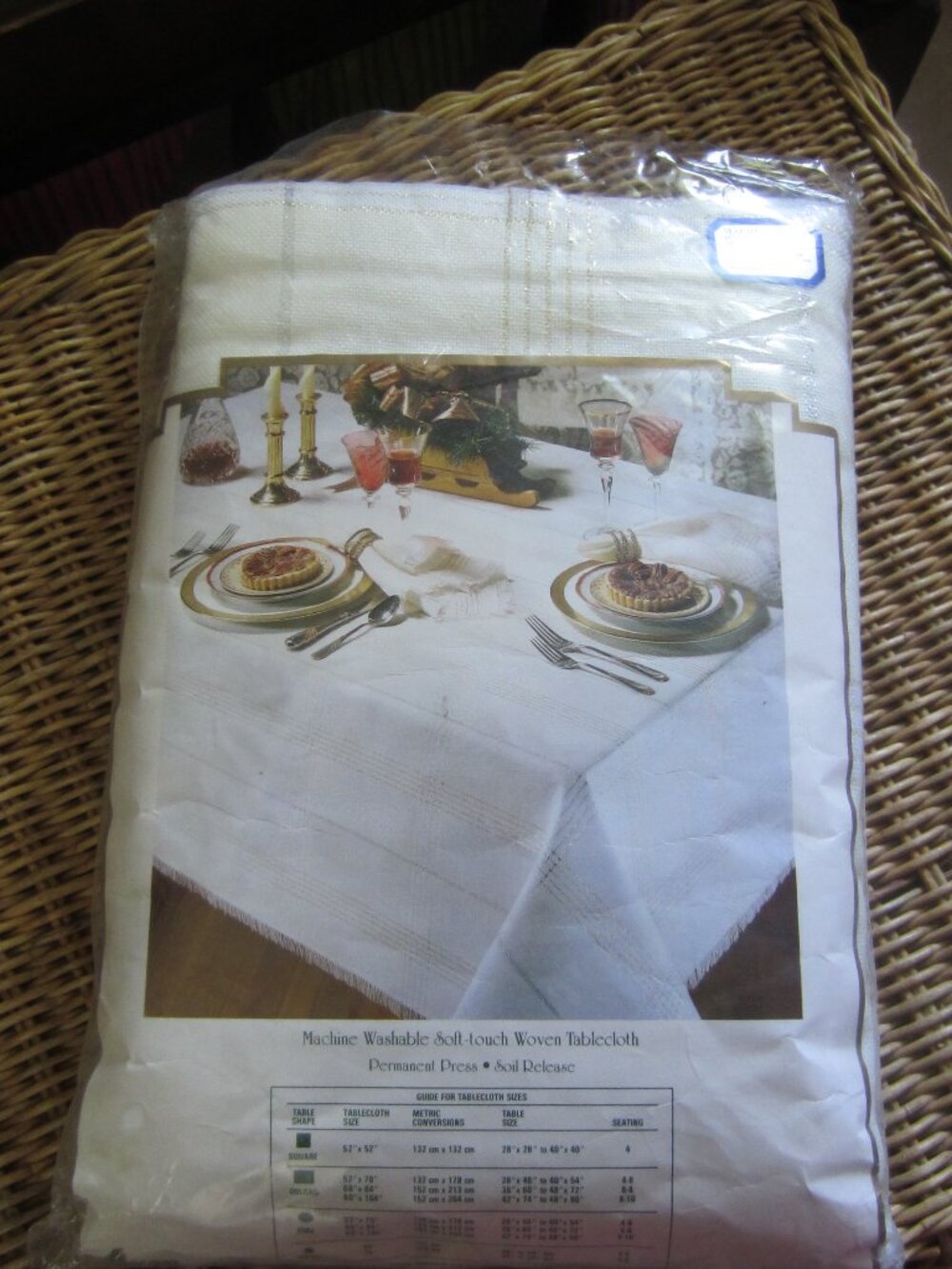 NWT/Tablecloth 60x120 with Gold and Silver Glitter Woven throughout.